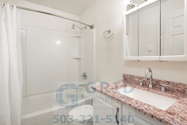 Building Photo - Two Story, Two Bedroom Apartment Available - Private Yard Space!