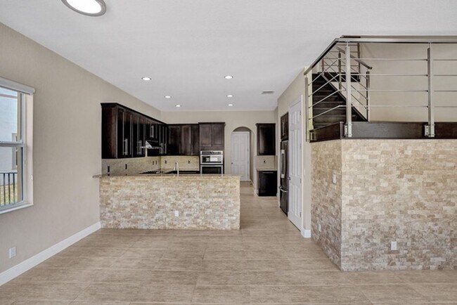 Building Photo - Great Pool Home with excellent lake View in Heron Bay, Parkland