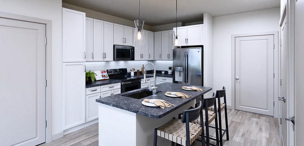 Experience culinary excellence in this sleek kitchen, where style meets functionality. - Livano Knoxville