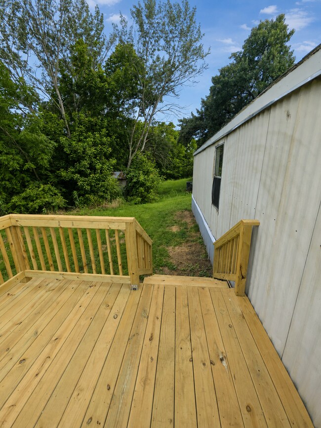 Building Photo - 2-Bedroom Home with New Wooden Deck in a Peaceful Sparta Setting