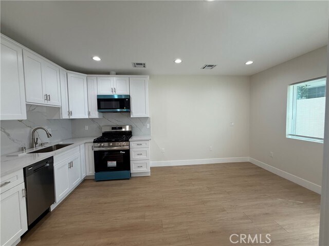 Building Photo - 6227 Wilkinson Ave