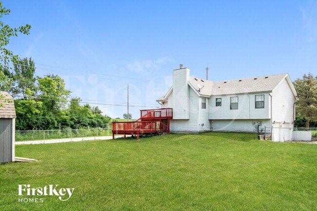 Building Photo - 11536 N Woodland Ave