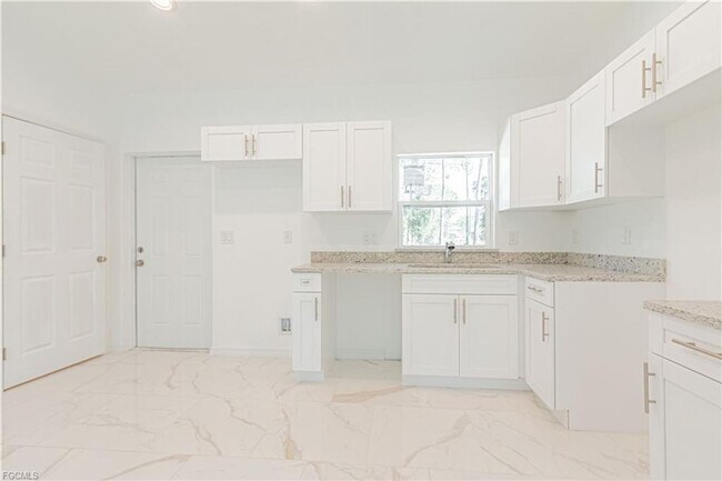 Building Photo - AVAILABLE NOW-TROPIC ACRES-THREE BEDROOM TWO BATH SINGLE FAMILY HOME.