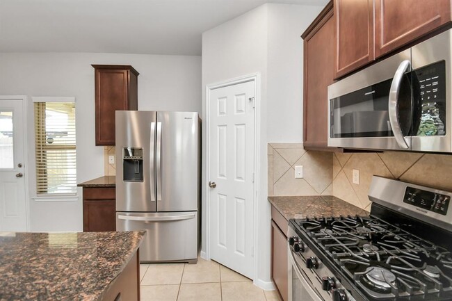 Building Photo - 7230 Victorville Dr