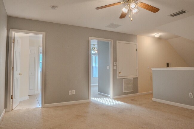 Building Photo - Spacious 5BR Home in Falcon Trace | 3-Car Garage | Screened Patio | Resort-Style Amenities Rent: ...