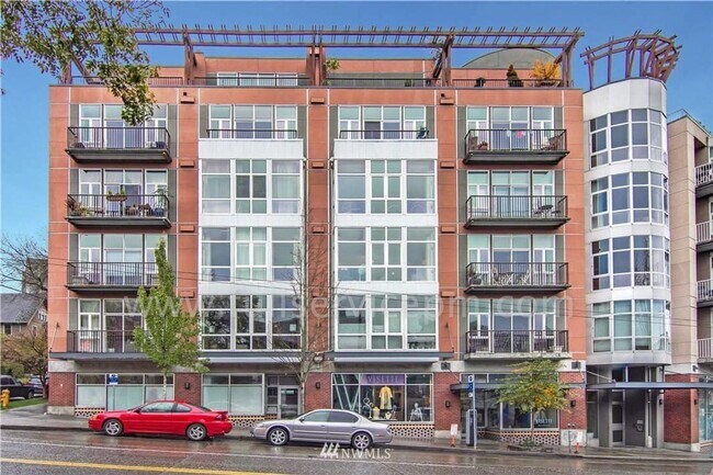 Building Photo - Stylish Capitol Hill Loft Condo w/ Floor-to-Ceiling Windows, Gas Fireplace