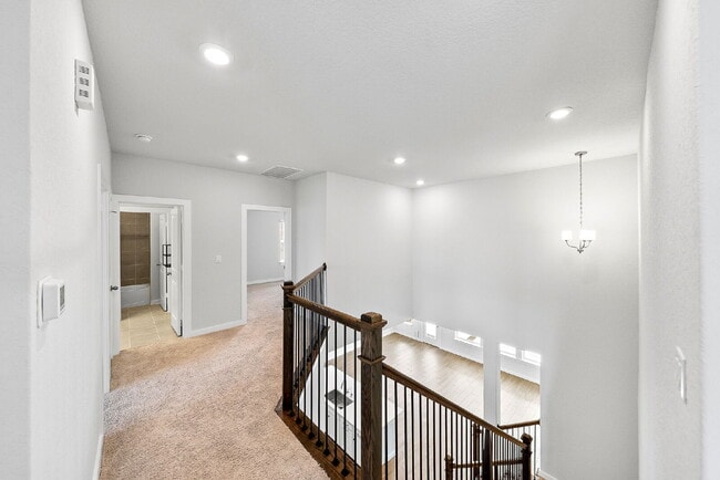 Building Photo - Greenbelt. 3 Car Garage. Built In Dog Room.