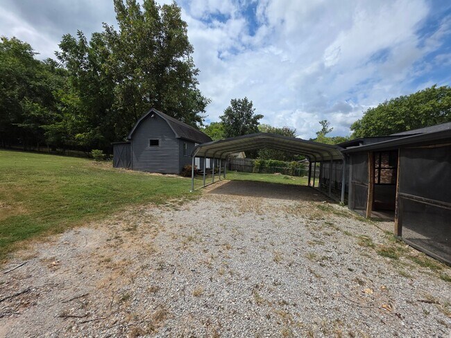 Building Photo - FOR LEASE Charming All-Brick Home on 1 Acr...