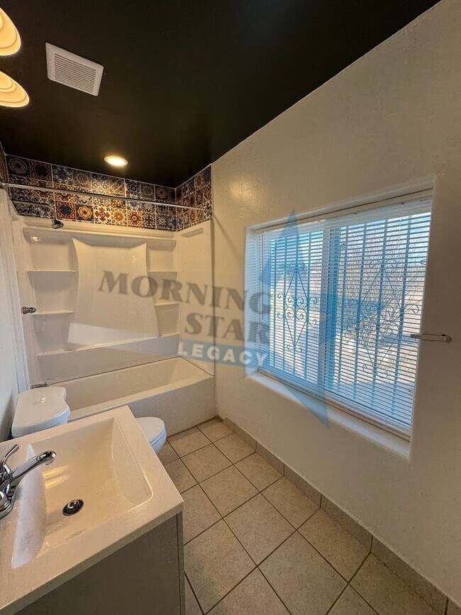 Building Photo - Charming Updated Home w/ Enclosed Yard & Storage