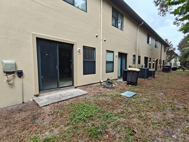 Building Photo - Spacious 2-Bed, 2.5-Bath Townhome with Gar...