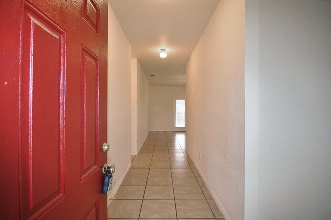 Building Photo - "Warm And Welcoming 3-2-2 With Open Living In a Prime Location!"