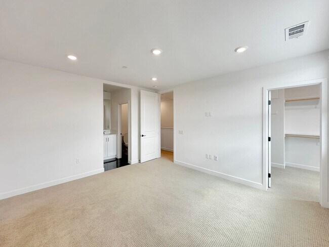 Building Photo - Luxury 3-Level Townhome for Rent | 2BR + 3BA | 1,500 Sq Ft with 2-Car Garage