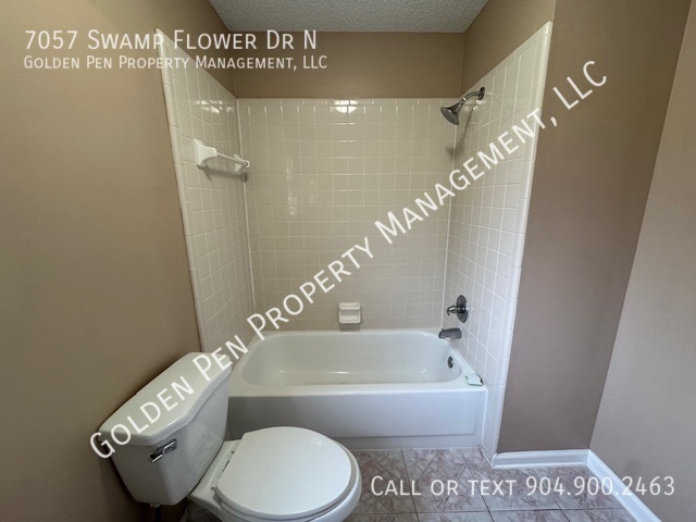 Building Photo - 7057 Swamp Flower Dr N