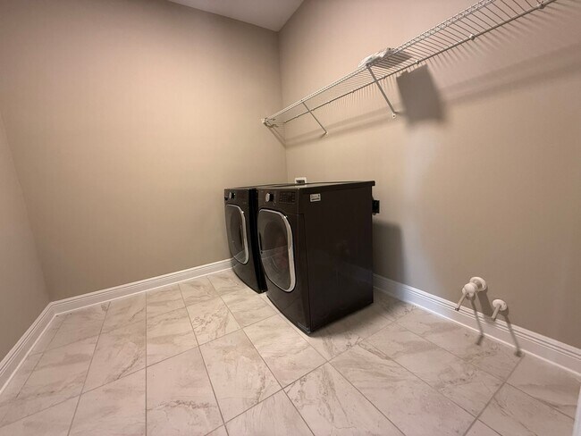 Building Photo - Brand-New 5BR/4BA Rental with Pond View, 4-Car Garage