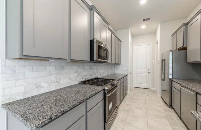 Building Photo - 711 Embercove Dr
