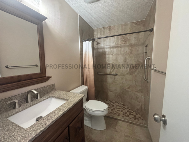 Building Photo - Welcome to your beautifully renovated 4-be...