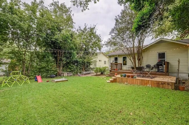 Building Photo - Discover Your Austin Oasis: Revitalized Bungalow with Hardwood Floors and Entertainer's Deck!