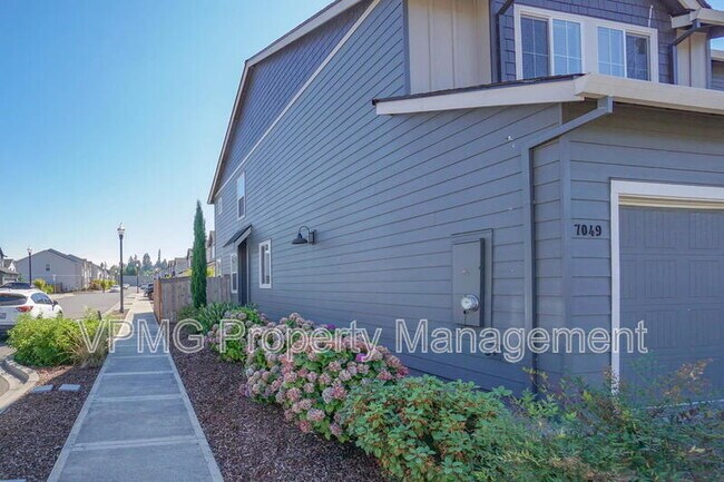 Building Photo - 7049 NE 4th Ct