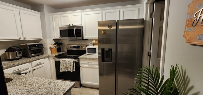 Building Photo - 7869 Ambassador Dr