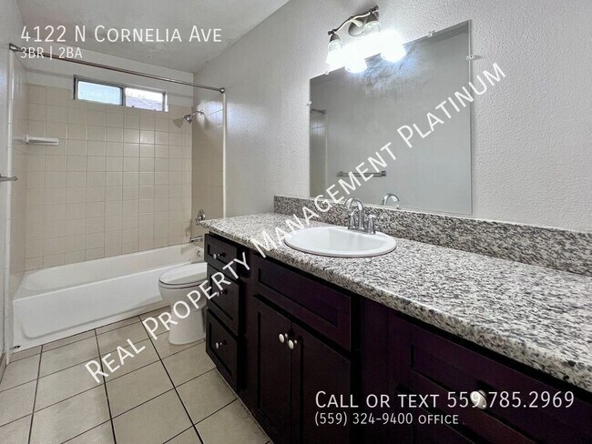 Building Photo - 4122 N Cornelia Ave