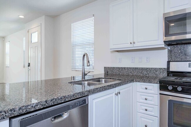 Building Photo - Modern, Move-In Ready Home with Attached 2-Car Garage