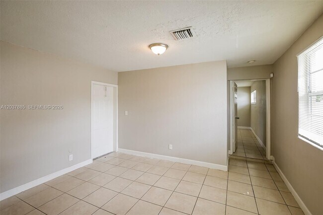 Building Photo - 5980 NW 24th Ct