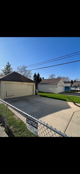 1 outside parking spot on the north/ right side of the driveway. - 213A S 76th St