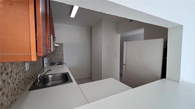 Building Photo - 3675 W 11th Ave