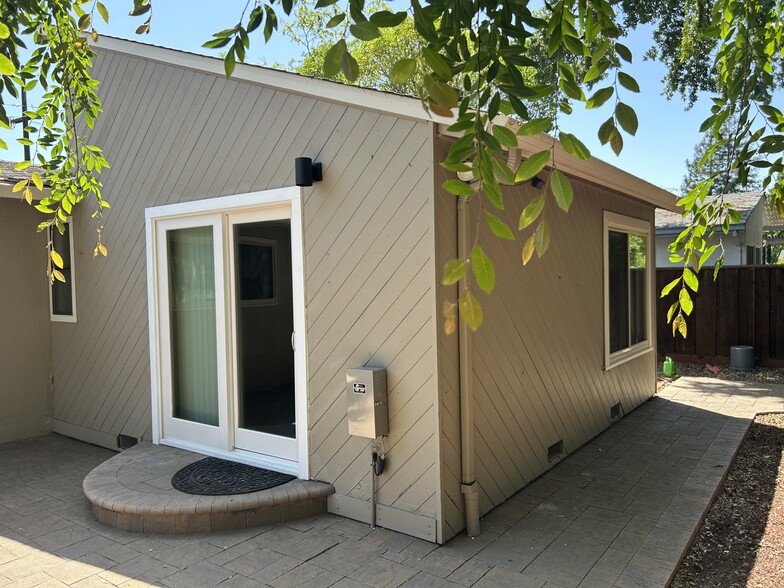 Entrance and rear window - 148 Kathryn Dr
