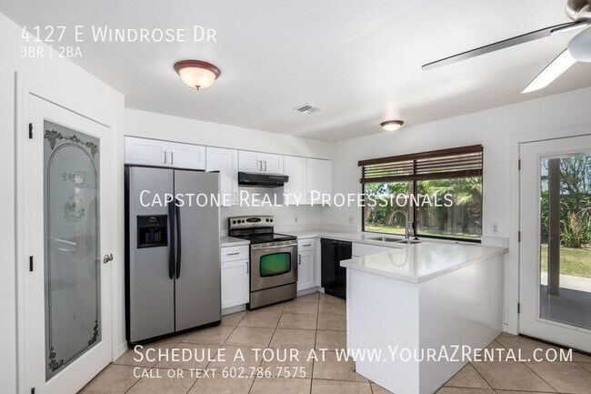 Building Photo - 4127 E Windrose Dr