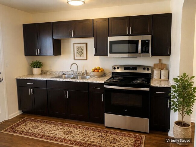 Building Photo - $500 OFF 1ST MONTH! $1,595/MO (GAS, WATER, SEWER & TRASH INCLUDED)