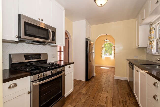 Building Photo - Beautifully Restored 3BR Miracle Mile Duplex | 1,725 SF | Near Metro D Line