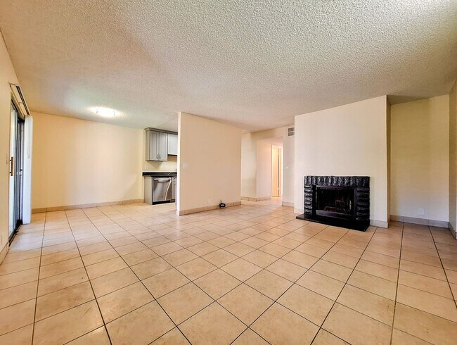 Building Photo - Beautifully Remodeled Second Floor Condo Across From Pool