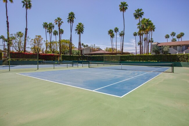 Building Photo - Stylish Ground-Floor Condo in Gated Palm S...