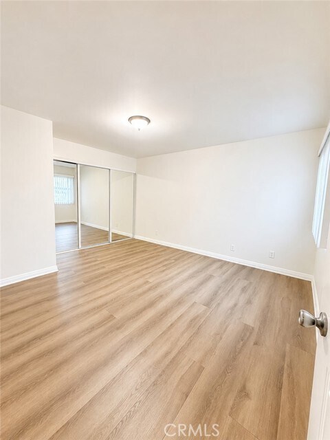 Building Photo - 10636 Woodley Ave