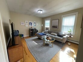 Cozy living room with tons of natural light, right off the kitchen - 34 F St