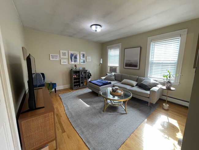 Cozy living room with tons of natural light, right off the kitchen - 34 F St