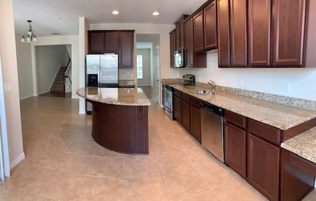 Building Photo - 3-story, 3/3.5, updated, townhome in the h...