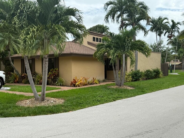 House is lake front, located at the corner of SW 131st Street and 91st Ct - 13169 SW 91st Ct