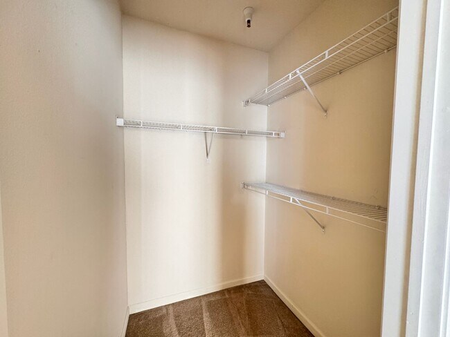 Building Photo - Home Near UNR: Spacious 4BR/4BA with Gated Access and Balcony!