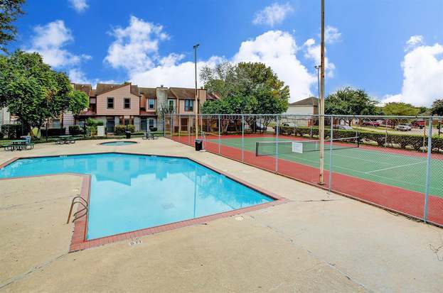 Tennis court/pool area - 12400 Brookglade Cir