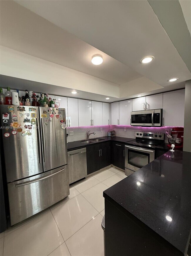 Building Photo - 19370 Collins Ave