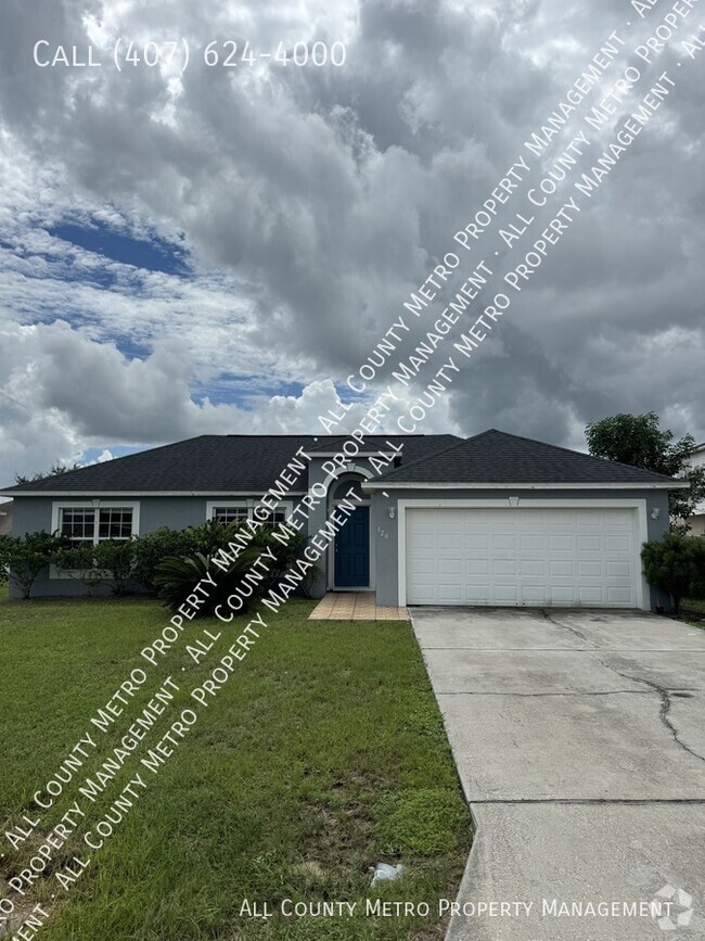 Building Photo - 3 Bedroom Poinciana Gem!