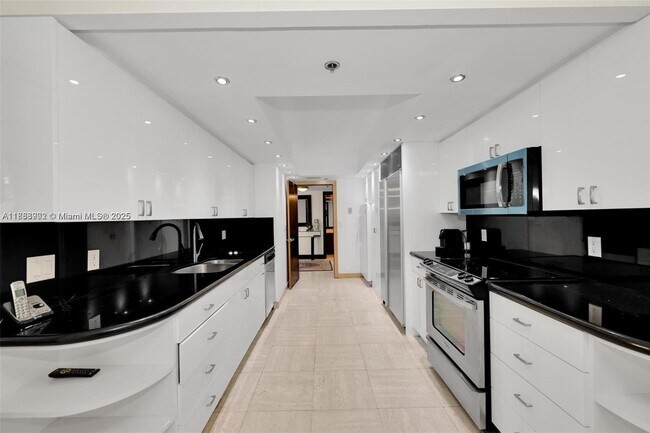 Building Photo - 10175 Collins Ave