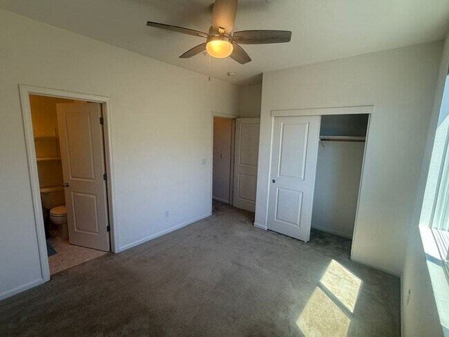 Building Photo - Large 3-Bedroom, 3.5 Bathroom Townhome in Metro Walk Village Neighborhood