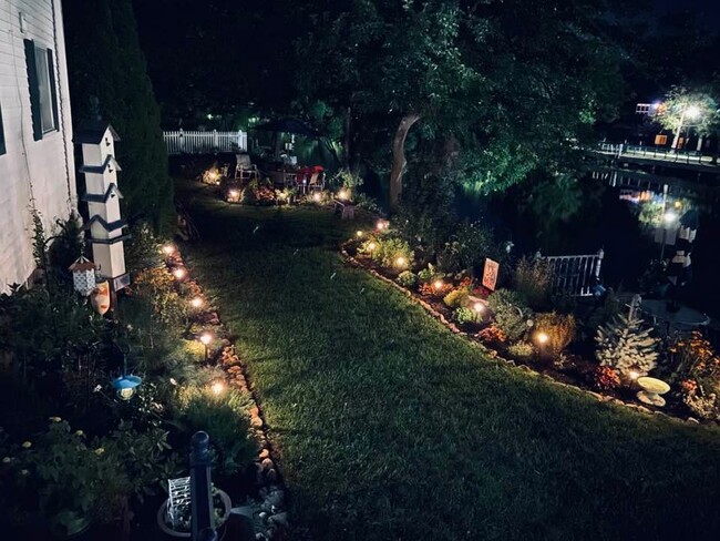 View of Backyard at Night - 20 Roselawn Ave