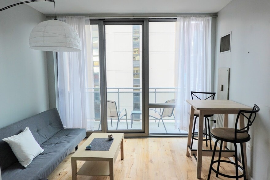 Living Room + Dining + Balcony - 1 E 8th St