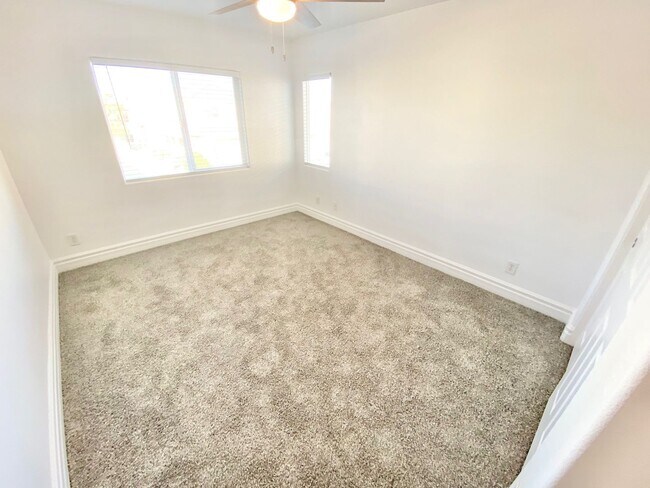 Building Photo - STUNNING 2 STORY HOME IN A GUARD GATED COM...