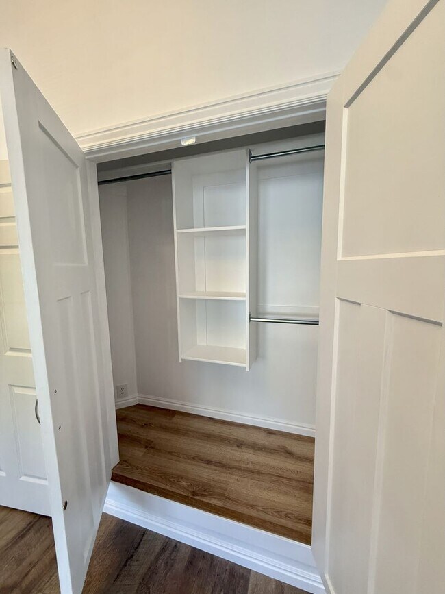 Building Photo - Timeless Charm, Modern Living — 4-Bed Gem ...