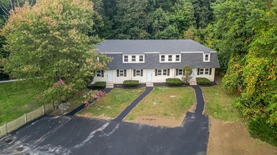 Building Photo - Modern, Cozy 2BR Home with Basement & Park...